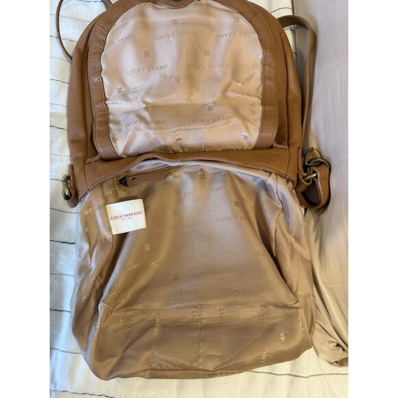 Lucky Brand | Ali Cognac Pebble Leather Flap Crossbody Saddle Bag Tan Tassel - Picture 7 of 12